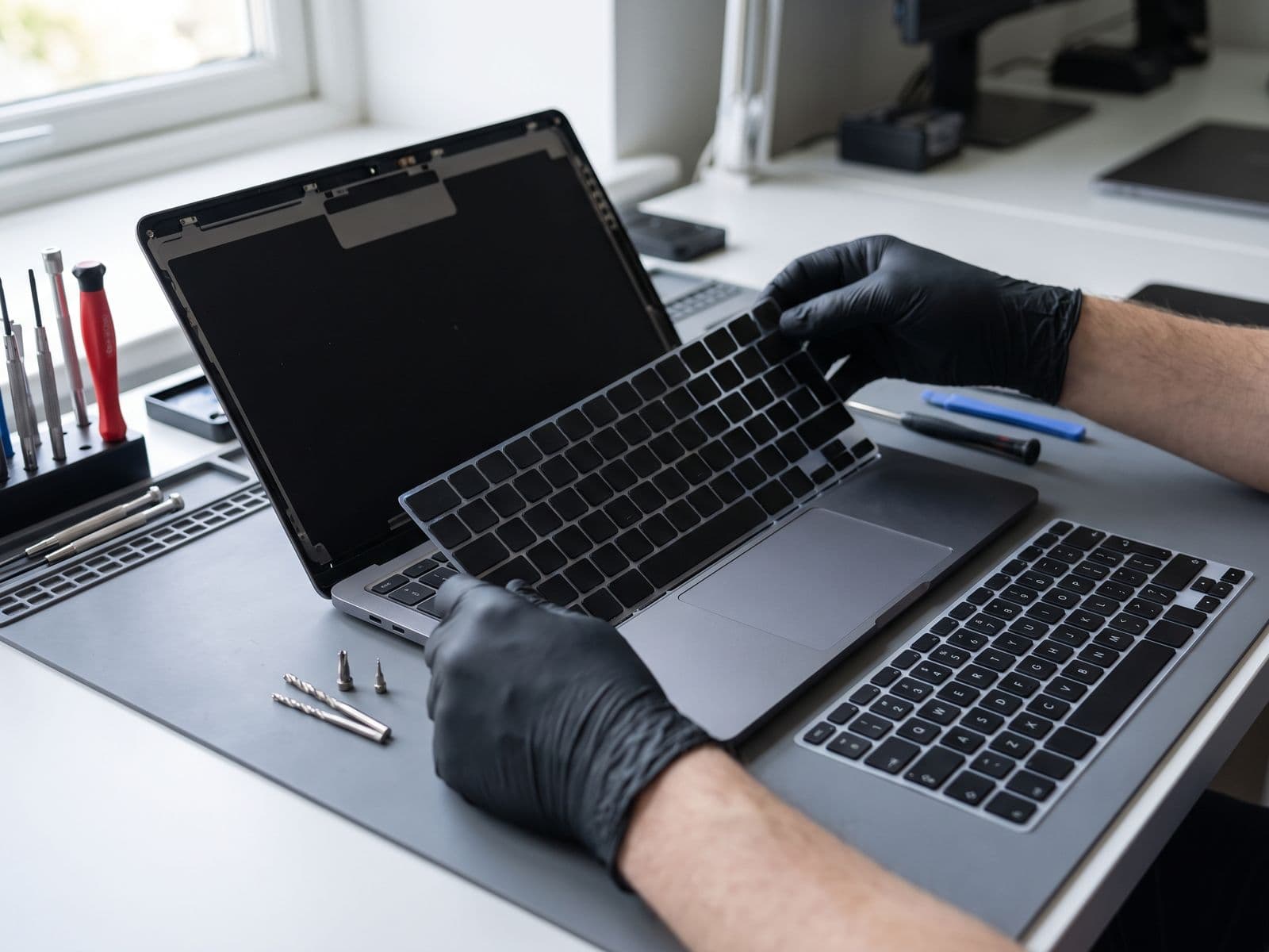 MacBook Battery vs Keyboard Repair: Which to Fix First (2026)